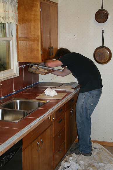 Tileman at Work
