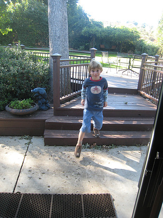 Aidan in Great Grandpa & Grandma's Backyard